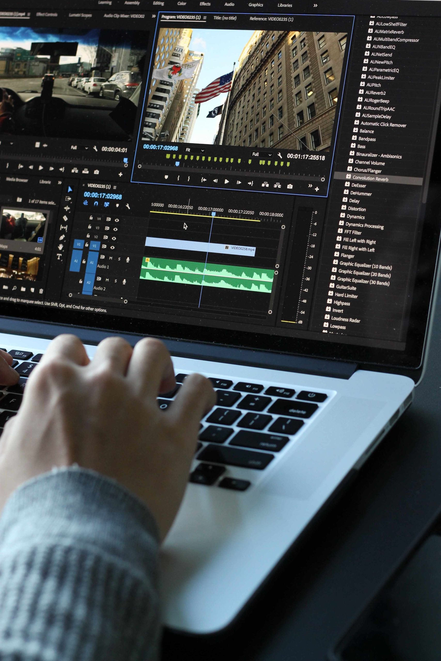 woman editing a video on laptop